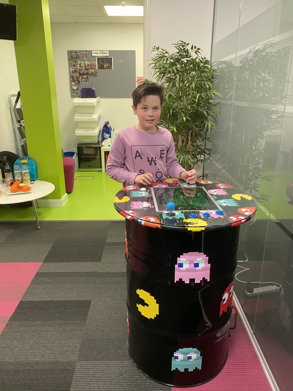 Harry playing Pac-Man at the office